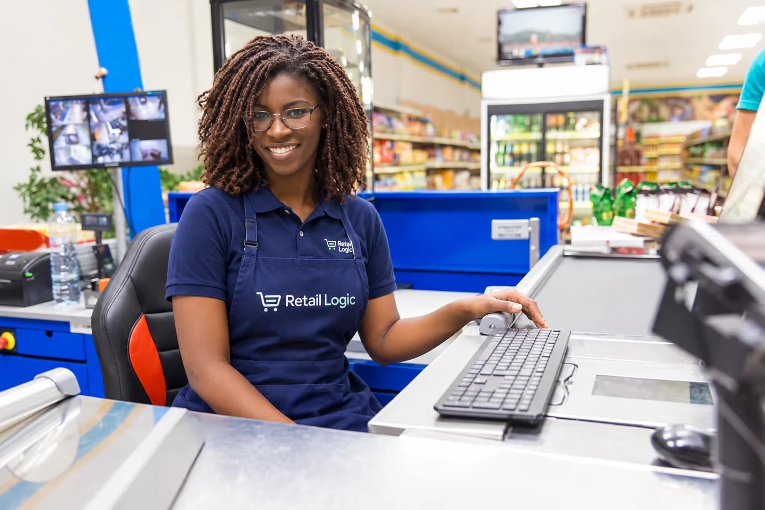 Retail Logic cashier at a supermarket checkout